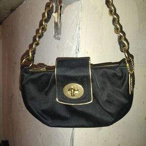 Satin coach purse